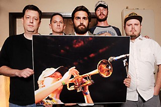 Present arms: (l-r) Matthew Downs, James Taylor, Jesse Moore, Blue Mongeon, and Gene Griffin with a photo of Pettis
