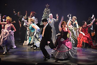 Party like it's 1899: Scrooge's nephew, Fred (Michael Valentine) and his wife (Kelly Petlin) lead the dancing at their holiday shindig