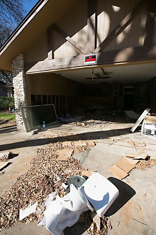Some homes, ruined by the 2013 flood, are still undergoing repair.