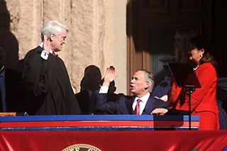Gov. Greg Abbott takes his oath of office during the legislative inauguration.