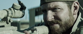 Bradley Cooper plays Chris Kyle in American Sniper.