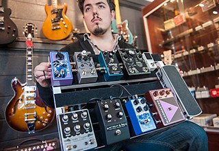 Calaveras Guitar Boutique's Tednoir Martinez and wares