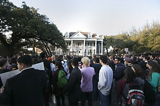 Protesters gather in front of the Fiji house on Feb. 12