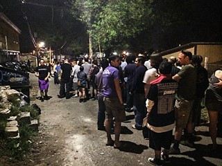 Fans lined up in the alley behind Licha's Cantina after fire marshals emptied a SXSW week Hum concert.