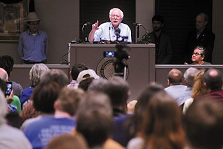 Flanked by columnist Jim Hightower and District 4 City Council Member Greg Casar, U.S. Senator Bernie Sanders, I-Vermont, called for economic justice and Wall Street reforms during a town hall meeting at IBEW Local 520 Union on March 31. The self-described democratic socialist is currently mulling a 2016 presidential run.