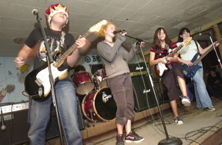 The Gig: Spontaneous Combustion -- Matt, Ellis, Rachel, Favi, and Claire -- defies authority with I Fought the Law.