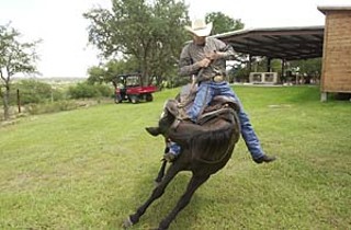 Cowboy and stunt actor Gil Dean shows how to bring down a horse without arousing the ire of PETA.