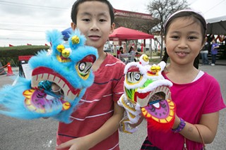 Alan Bao, 11, and Chloe Bao, 9, celebrate Chinese New Year at the Austin celebration Feb. 10.