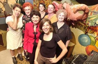 All in the Family (l-r): Wendy Noonan, Stella Boes, Nicki Mebane, Mary Najera, Ami Jost, Tony Smith, Glenda Smith, and one of the pink elephants that keeps crashing Li'l Cap'n Travis' car.