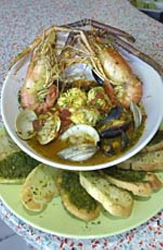 Bouillabaisse at South Congress Cafe<br>
1600 S. Congress, 447-3905<br>
Brunch: Saturday-Sunday, 10am-3pm; Lunch: Monday-Friday, 11am-2pm; Happy-hour dining: Every day, 2-5pm; Happy-hour drink specials: Monday-Friday, 2-6pm; Dinner: Every day, 5pm-10ish pm