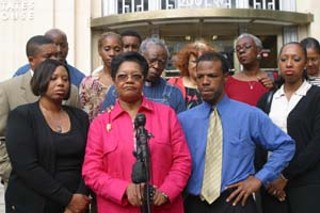Barbara Shorts, Hazel Obey, and family and
supporters of Jessie Owens gather on the steps of
the federal courthouse.