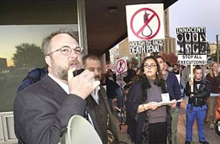 UT professor Rob Owen speaks to activists protesting the death penalty on International Human Rights Day, Dec. 10, outside the Governor's Mansion.