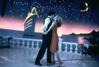 Raul Julia and Terri Garr in <i>One From the Heart</i>