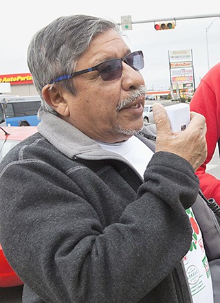 Council Member Sabino Renteria speaks Saturday outside of Popeyes.