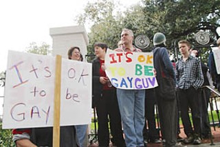 Gay rights activists rallied outside the Governor's
Mansion on Tuesday to show their support for Gov.
Rick Perry's alleged lifestyle choices. Yes, we're talking
about The Rumor, and no, we haven't found any
substance to it. See <a
href=pols_naked4.html><b>The Real Sins of Gov.
Perry</b></a>.