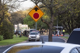 Law enforcement Monday morning in the Travis Country neighborhood, site of the fourth bombing