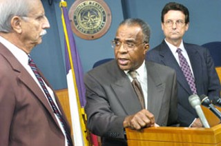 Travis Co. Judge Sam Biscoe (center) says there's no evidence of improprieties in the Medical Examiner's Office.