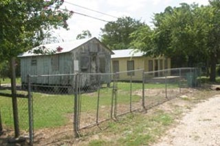 The South Taylor neighborhoods where nine people were arrested last year and charged with selling crack are poor, the houses in need of major repairs. Nonetheless, Williamson County District Attorney John Bradley told the press that the nine were high level drug dealers.