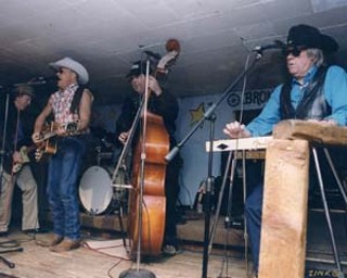 Lawd I'm Just a Country Boy (l-r): John X Reed, Alvin
Crow, Cowboy Dick Dennis, and Doug Sahm playing
in the mid-Nineties at the Broken Spoke