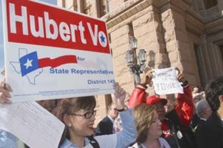 Demonstrators at the Capitol call on Dist. 149
incumbent Talmadge Heflin to give up his challenge to
the election of Democrat Hubert Vo, who beat Heflin in
November by 33 votes.