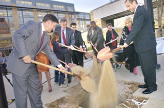 The Austin City Council inaugurates the new City Hall
by burying a time capsule to be opened in 2105.