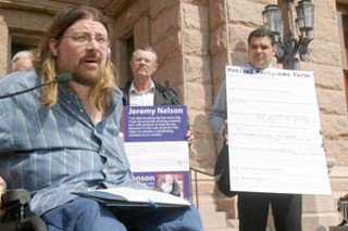 Activists from Texans for Medical Marijuana 
converged on the Capitol on Feb. 17 to urge support 
for House Bill 658, which would allow medical 
necessity as a defense against prosecution for 
possession. Chris Cain (in wheelchair) told TMM 
supporters on the Capitol steps about the harassment 
he has received from law enforcement officials for his 
support and use of medical marijuana. For more info, 
see <a href=http://www.austinchronicle.com/issues/dispatch/2005-02-25/pols_feature8.html>Weed Watch</a>.