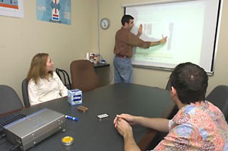 (l-r): Loop One's Elli Swift, James Fenelon, and Tim Thomas at work revamping SpikeG.com