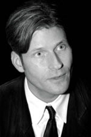 The enigmatic Crispin Glover, cornered by
photographer Bob Sherman at the Downtown Alamo
Drafthouse during the showing of Glover's <i>What Is
It?</i>