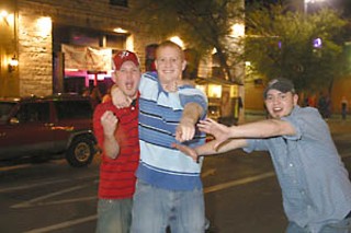 A group of typical Sixth Street partiers gets a little
rowdy. Police and city officials say a zero-tolerance
policy is necessary to keep order and protect public
safety; police and business officials in New Orleans
say a little bit of tolerance keeps that city’s tourism
industry thriving.