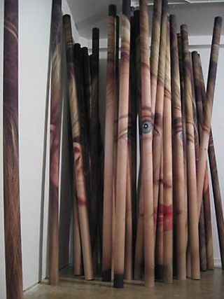 <i>Hillerova’s Faces</i><br>
What’s it like for Hana Hillerova, an artist in her own
right, to have her face so big and so, well, tubally
diversified by her friend (and fellow graduate student)
Young-Min Kang?
<br> “It’s great,” says the Prague native and director
of UT’s Creative Research Laboratory at Flatbed
World Headquarters, “because now people come up
and say ‘I saw you at City Hall!’ when I haven’t even
been there.”
<br>
The 10-foot-tall <i>Hillerova's Faces</i> is Kang's
contribution to the Elizabeth Wynn-curated collection
of local artists' works graphically complicating the
walls and spaces of the new City Hall. At that height,
it's quite a bit taller than its own subject. It's
interesting to see my face so blown up like that, so
detailed, says Hillerova. Although I'm seeing things
about myself that I never noticed were there, and I
don't know if that's necessarily a good thing. But there
I am.<i> </i>