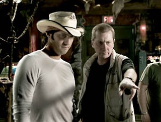 Robert Rodriguez and Frank Miller
on the set of the Austin-shot <i>Sin City</i>, an adaptation of Miller's
graphic-novel series. The film opens on Friday, April 1. For a review
and showtimes, see Film Listings.