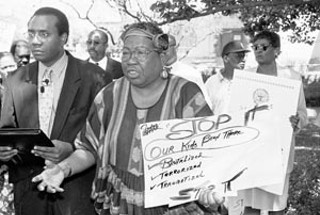Austin civil rights activist Dorothy Nell Turner, 69, died
Wednesday, April 6, after a lengthy illness. Turner,
former president of the Black Citizens Task Force, was
both legendary and notorious for her uncompromising
approach to battles over discrimination in employment,
Eastside economic development, and a host of more
specific issues like the 1995 Valentine's Day police
assault on a Cedar Street party – Turner is pictured
here during a Cedar Street protest at the federal
courthouse. Funeral services for Turner are today
(Thursday), noon, at St. John's Tabernacle Church, 7501
Blessing Ave.