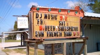 Charlie's Lounge – note the French Band advertised for a traditional Sunday French dance.