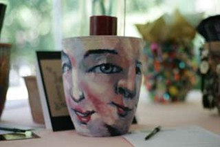 One of the dozens of pots painted and planted by local celebs (this one by artist Nathan Jensen) for the auction at the Umlauf Sculpture Garden Party