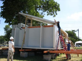 UT Solar Decathlon Team members construct the all-solar 
house that will compete in Washington D.C.