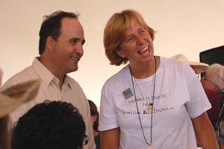 Groom-to-be Peter Ravella confers with Cindy Sheehan prior to the nuptials.