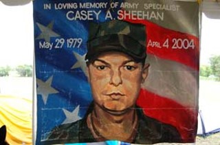 The banner depicting Army Spc. Casey Sheehan, painted to greet Cindy Sheehan on her return to Camp Casey
