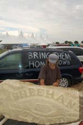 Ron Teska of Pennsylvania carves a sandstone monument to Sheehan's Stand.