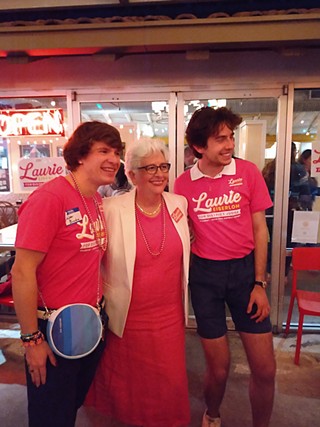 Judicial candidate Laurie Eiserloh takes photos with supporters at Santa Rita Cantina during election night Tuesday, March 1