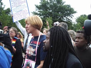 Cindy Sheehan marches in Washington, D.C. – with
about 100,000 or more of her closest personal friends
– in her crusade to stop the Iraq war. On Monday,
Sheehan was arrested for refusing to leave her spot in
front of the White House.<br>(Photo courtesy of
David Swanson/afterdowningstreet.org)