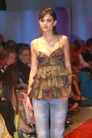 Part of the camouflage collection by Michael Kors, as shown on the runway of the fabulous St. Thomas Boutique benefit for the Austin Children's Shelter. Camouflage is the new denim, said one viewer. We beg to differ, but c'est la vie, right?