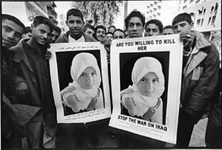 Posters using this photograph of Asra'a, snapped on a 
bus by documentary photographer Alan Pogue in 2000, 
were downloaded from the No More Victims Web site in 
nine different languages and used in anti-war protests 
all over the world.
