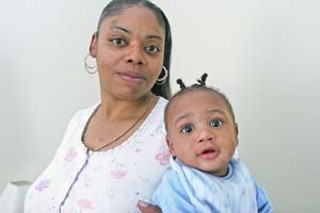 Lisa Stampley and son Hakeem are a couple of the
thousands of Katrina evacuees the city placed in rental
properties throughout town, and whose rent and utilities
are, for now, covered by FEMA.