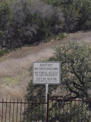 Signs warn the public away from the Balcones Canyonlands Preserve's songbird habitat