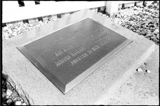 This memorial to the four victims of the yogurt shop murders sits in the parking lot of the Anderson Lane shopping center where they were killed.