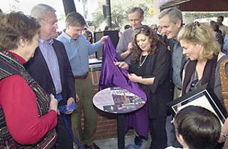 Betty Dunkerley, Lee Leffingwell, Will Wynn, Daryl Slusher, Susan Antone, and Lloyd Doggett unveil the Antone's commemorative plaque.