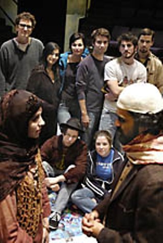 Steve Moore (upper left) and the company of <i>Kneeling Down at Noon</i>