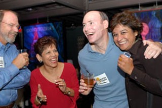 LIBRARIES (l-r): Al Simmons, Foundation board member;
Amalia Rodriguez-Mendoza, Advisory board member;
Eric Behrens, Foundation board president; and Patricia
Fraga, marketing director celebrate the Prop. 6 victory.