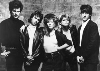 The World’s Cutest Killers featured not only Kathy Valentine but Jesse Sublett, standing on the left