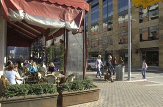 Dense and walkable: VMU promotes the stacking of apartments and condos over shops, cafes, and small offices to create a lively streetscape like that of Downtown's 2nd Street District